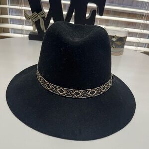 C.C Exclusives black wool floppy hat with an Aztec-patterned hat band